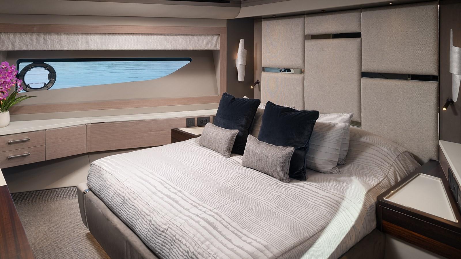 a bed in a room aboard MOWANA Yacht for Sale