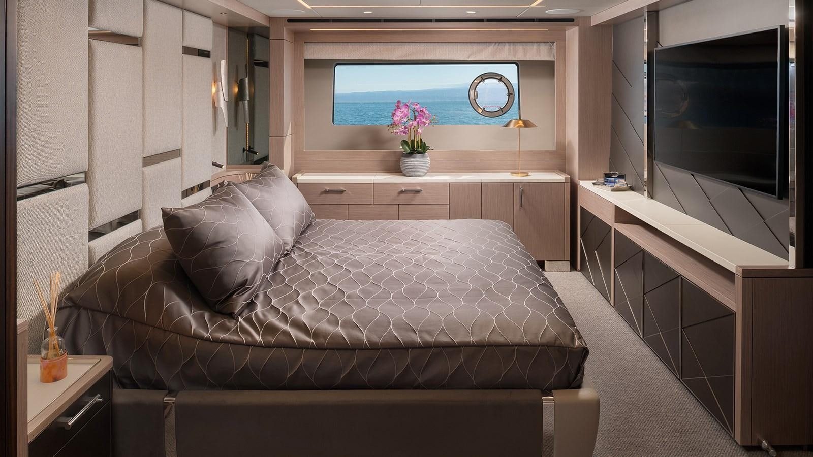 a couch in a room aboard MOWANA Yacht for Sale