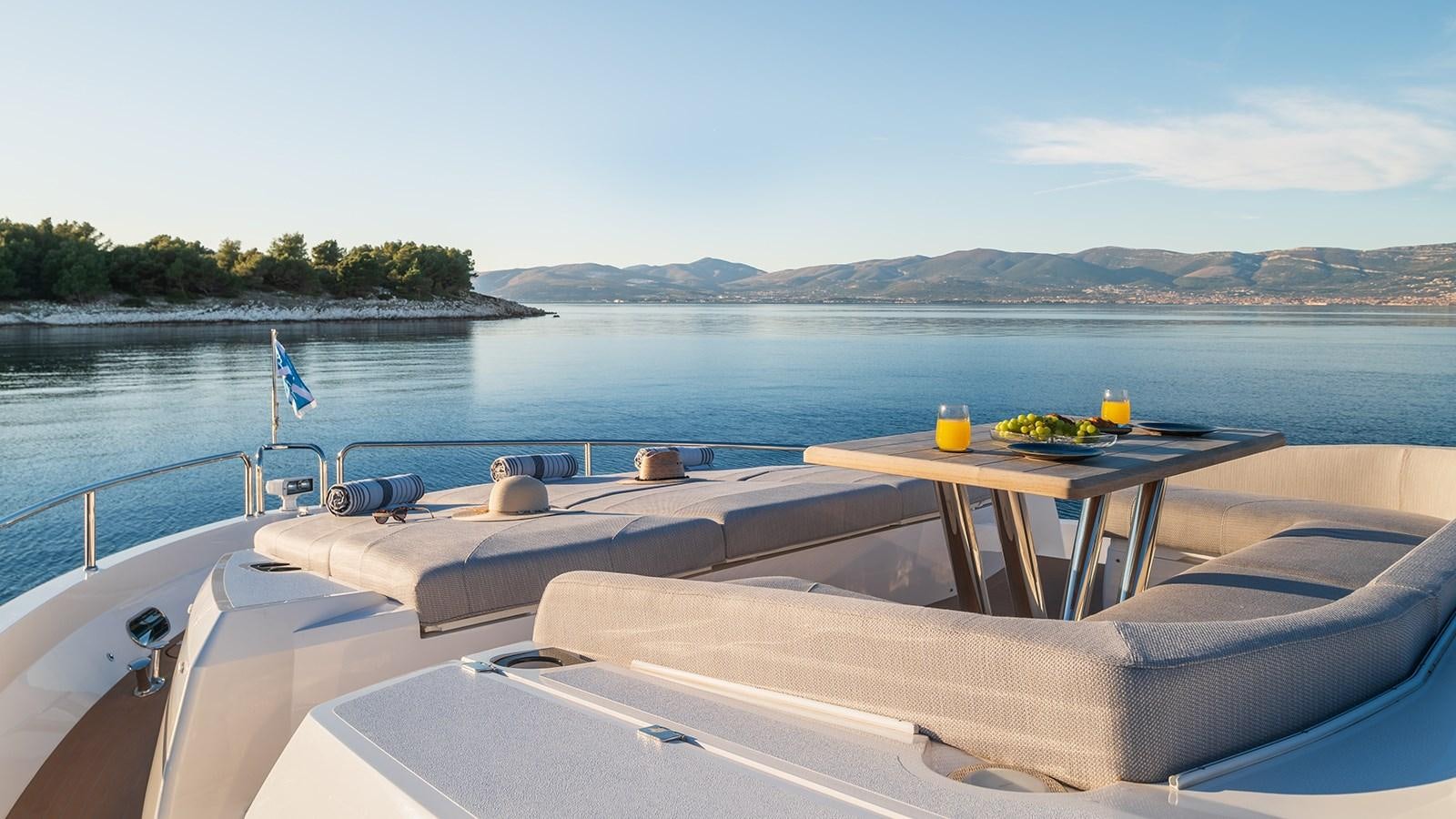 a boat on a lake aboard MOWANA Yacht for Sale