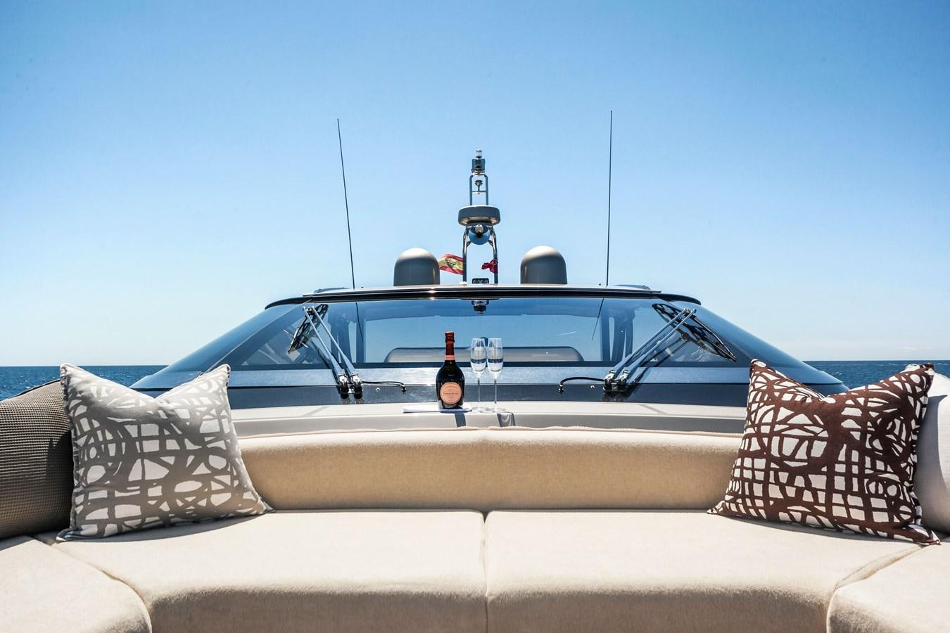 a boat on a couch aboard MINE Yacht for Sale