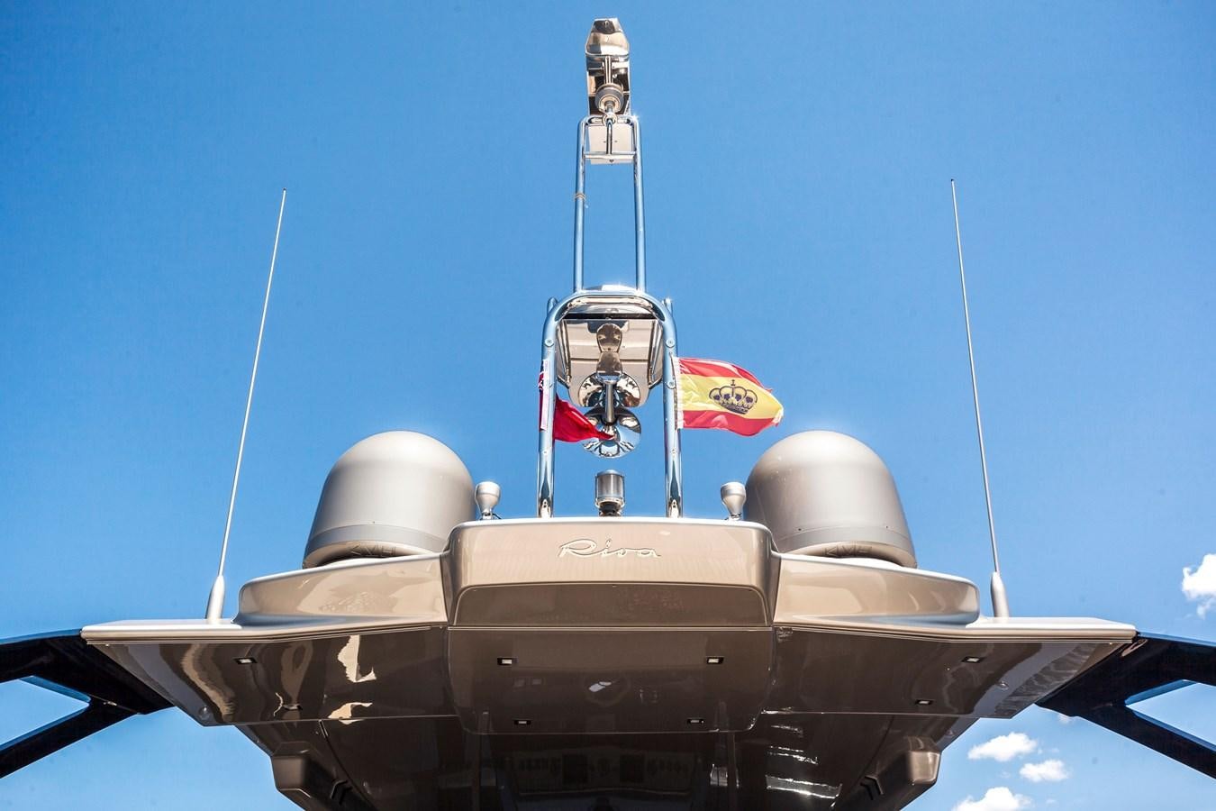 a person standing on a military vehicle aboard MINE Yacht for Sale