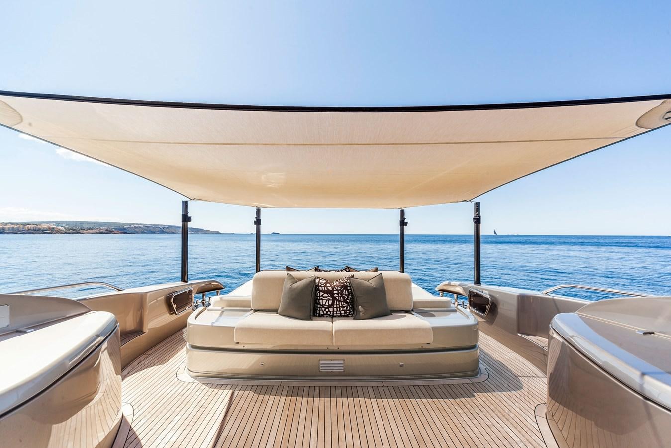a room with a bed and a large body of water aboard MINE Yacht for Sale