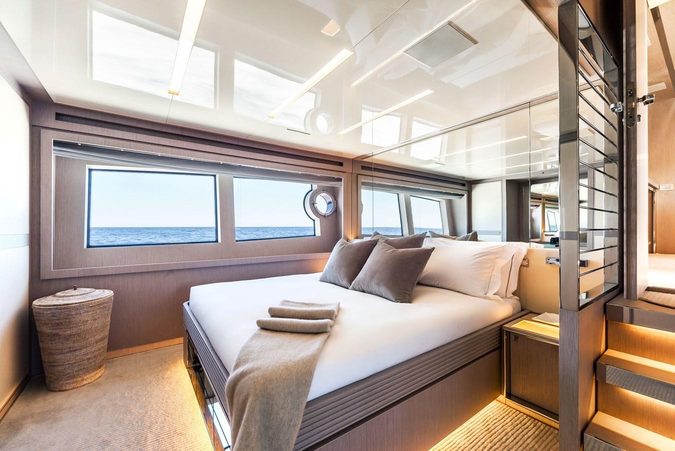 a bed in a room aboard MINE Yacht for Sale