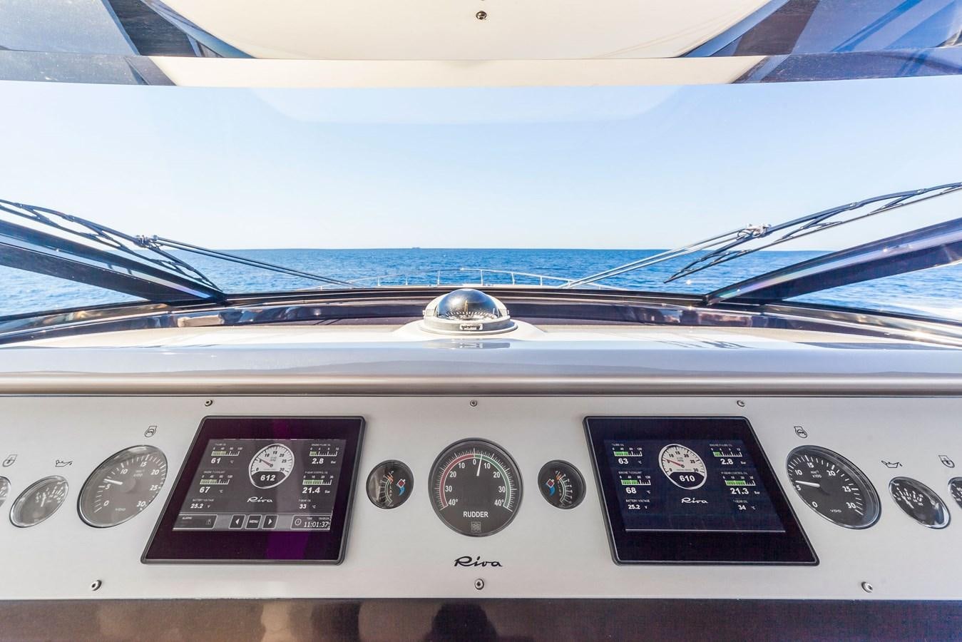 the inside of a car aboard MINE Yacht for Sale