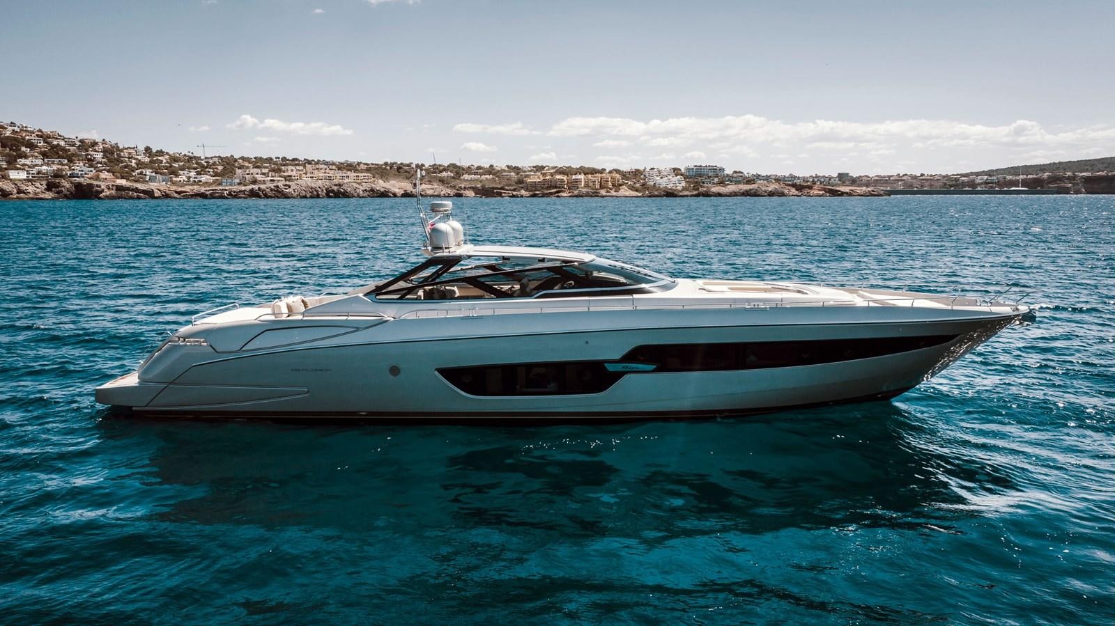 a white boat in the water aboard MINE Yacht for Sale
