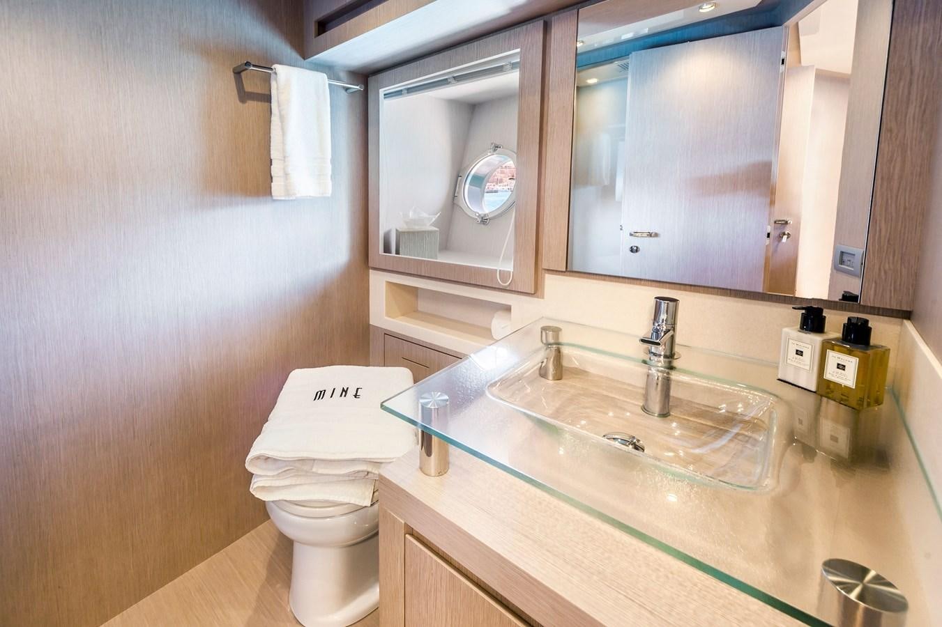 a bathroom with a sink and a toilet aboard MINE Yacht for Sale