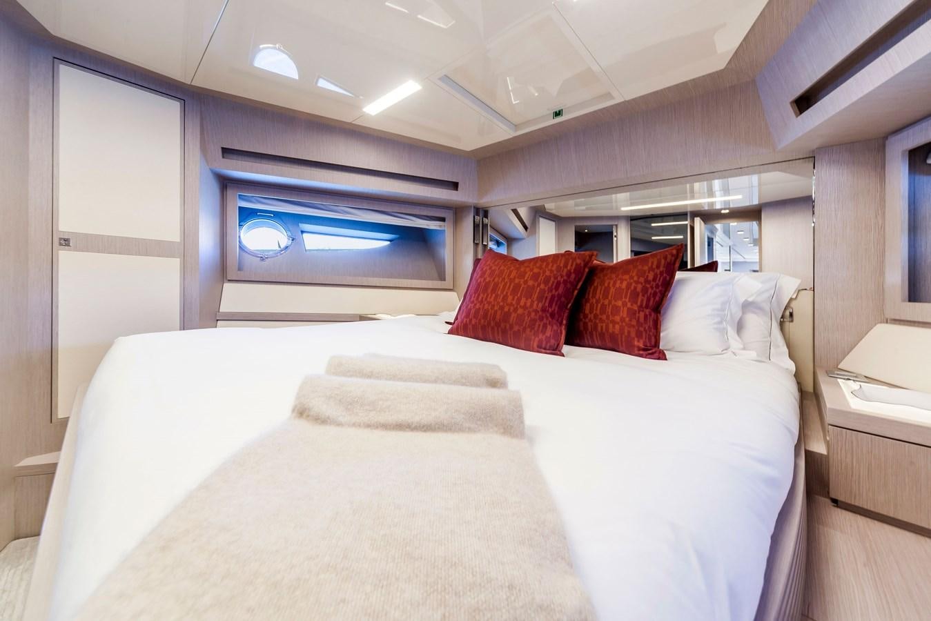 a bed with pillows aboard MINE Yacht for Sale