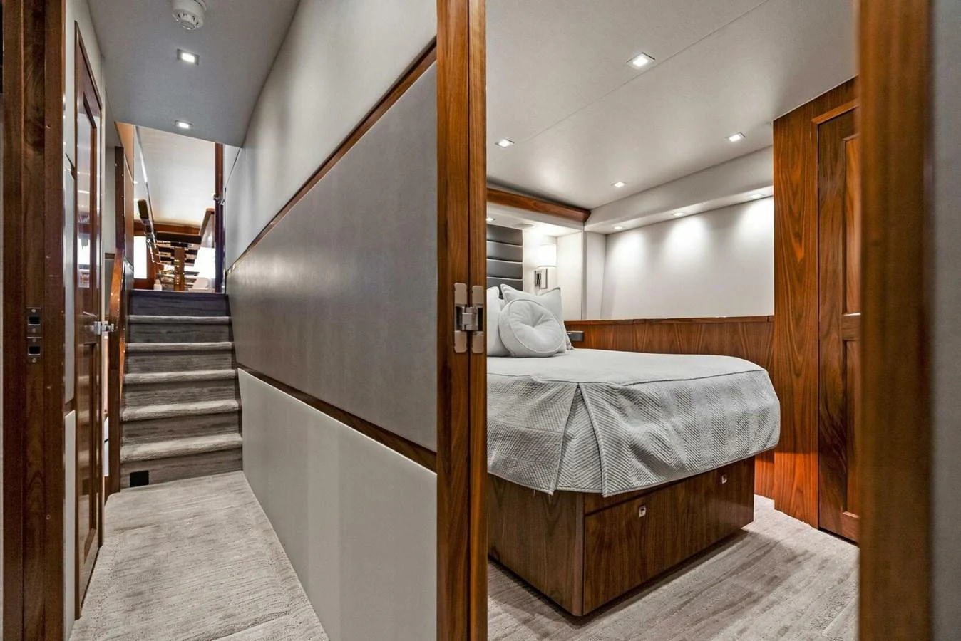 a bed in a room aboard TEAM MAYHEM Yacht for Sale