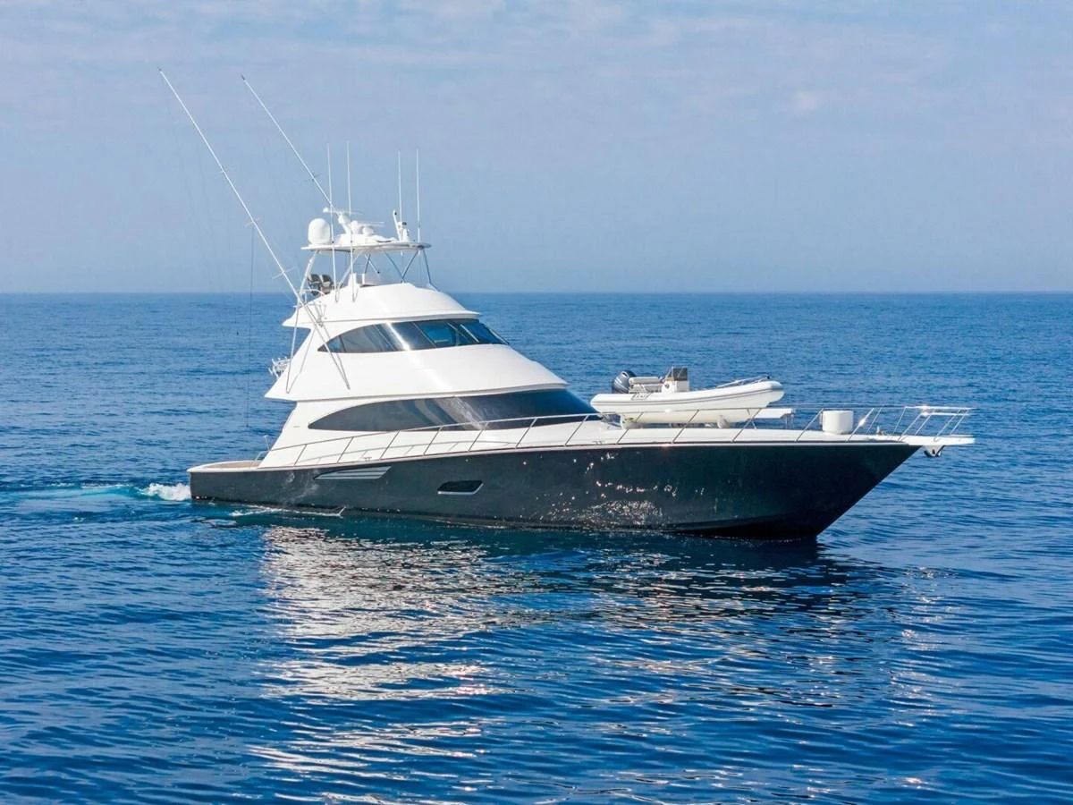 a white yacht in the water aboard TEAM MAYHEM Yacht for Sale