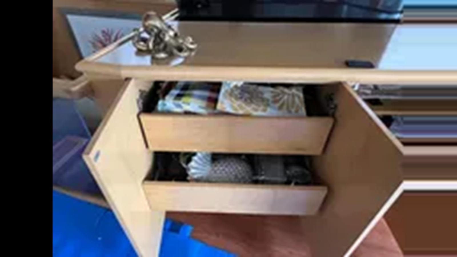a box with a pair of scissors on it aboard 1999 HATTERAS 74 SPORT DECK MOTOR YACHT Yacht for Sale