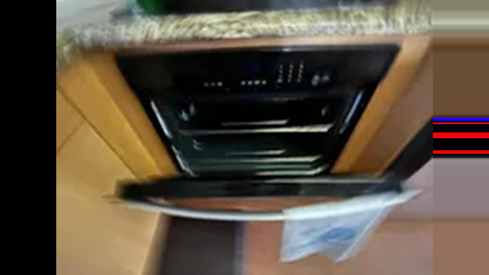 a black electronic device aboard 1999 HATTERAS 74 SPORT DECK MOTOR YACHT Yacht for Sale