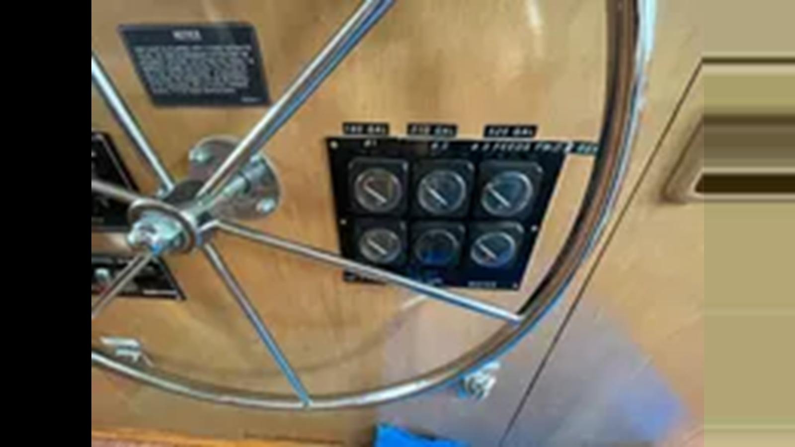 a close-up of a machine aboard 1999 HATTERAS 74 SPORT DECK MOTOR YACHT Yacht for Sale
