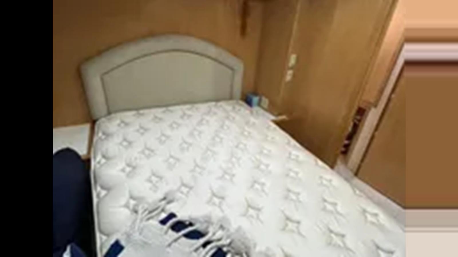 a bed with a white sheet aboard 1999 HATTERAS 74 SPORT DECK MOTOR YACHT Yacht for Sale