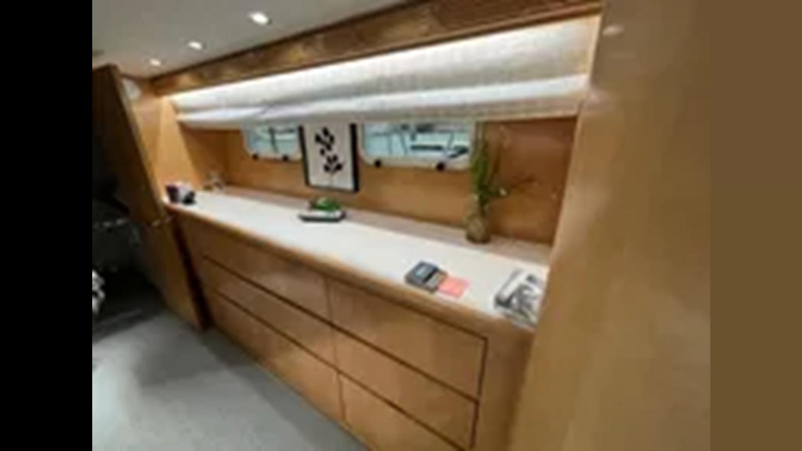 a counter top with a plant on it aboard 1999 HATTERAS 74 SPORT DECK MOTOR YACHT Yacht for Sale