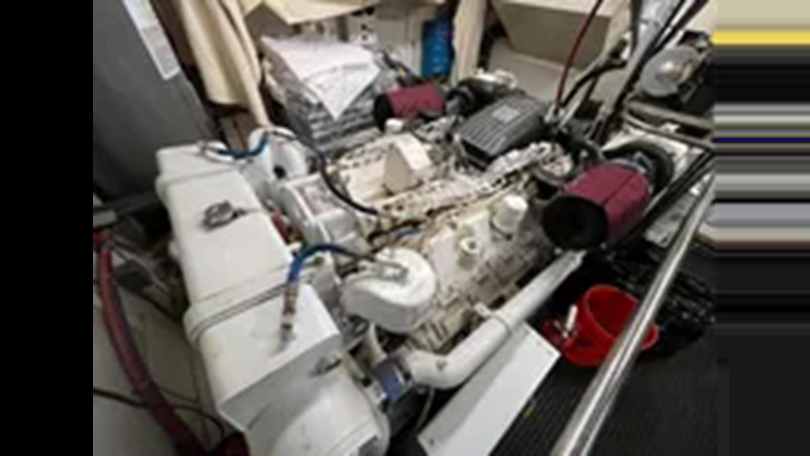 a car engine with a red light aboard 1999 HATTERAS 74 SPORT DECK MOTOR YACHT Yacht for Sale