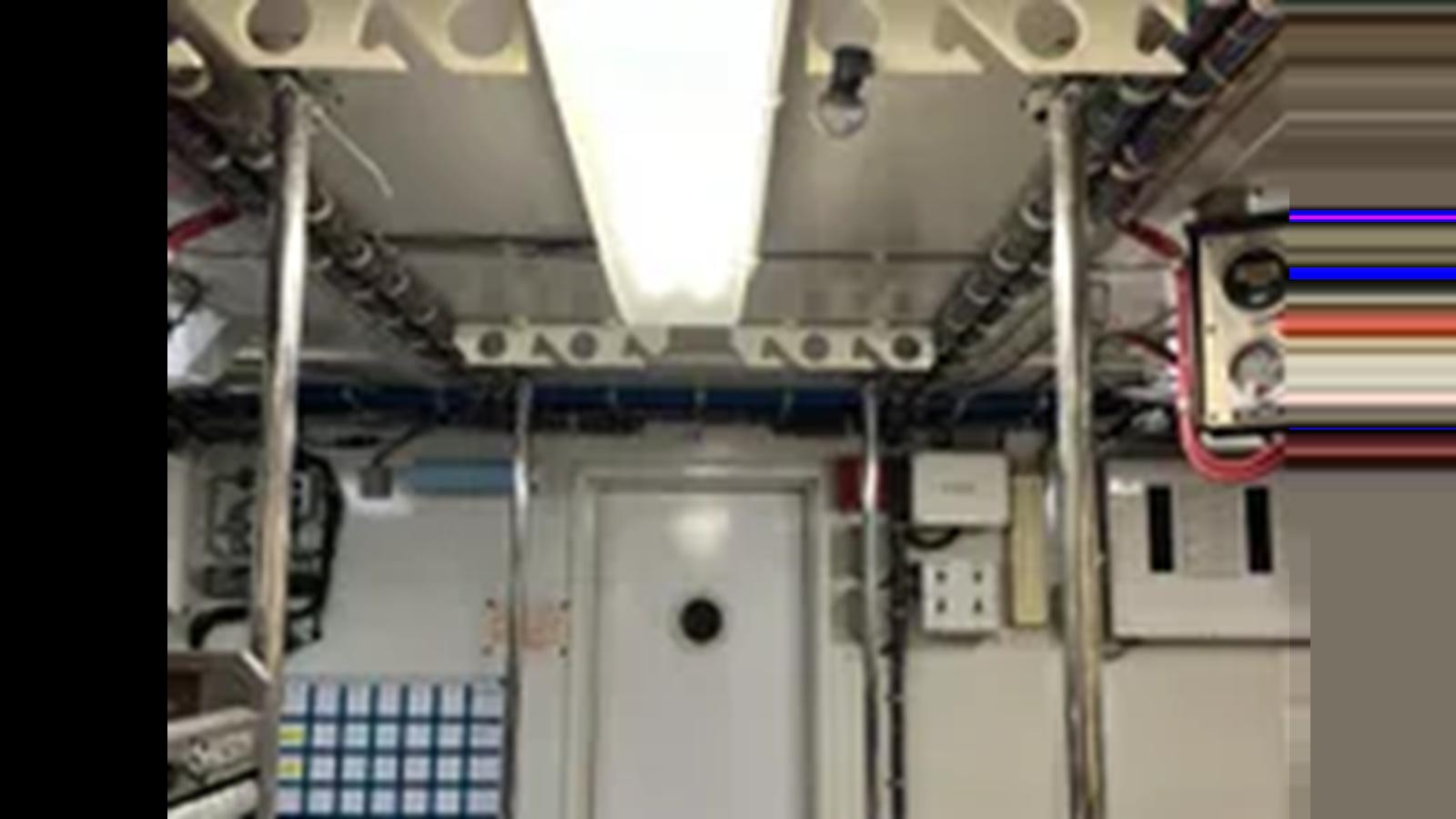 a machine with wires aboard 1999 HATTERAS 74 SPORT DECK MOTOR YACHT Yacht for Sale