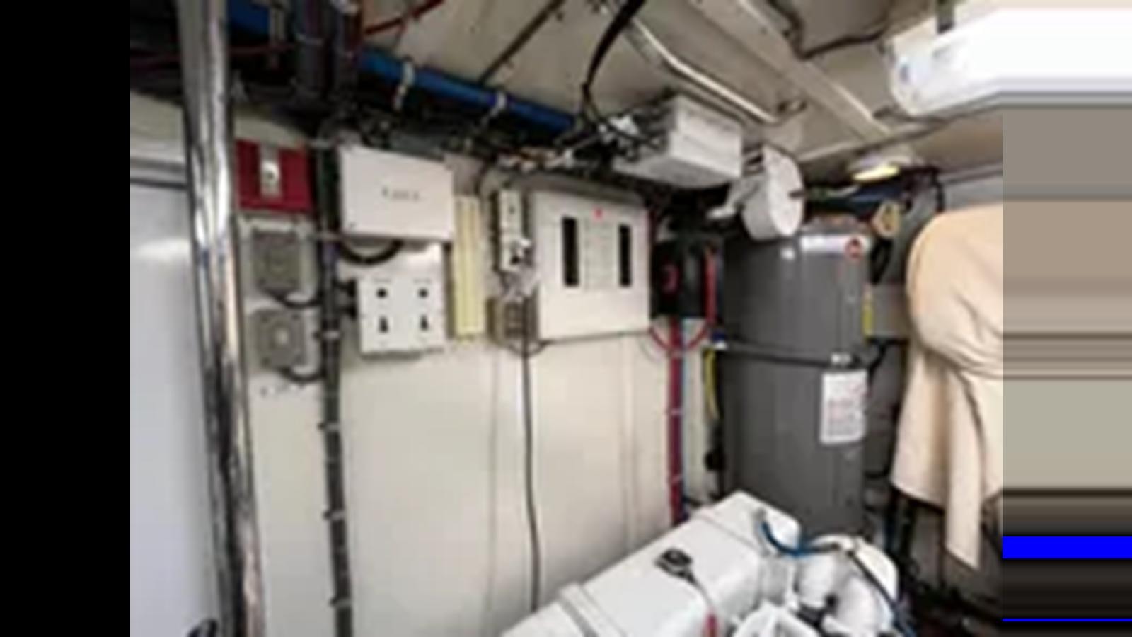 a machine with wires aboard 1999 HATTERAS 74 SPORT DECK MOTOR YACHT Yacht for Sale