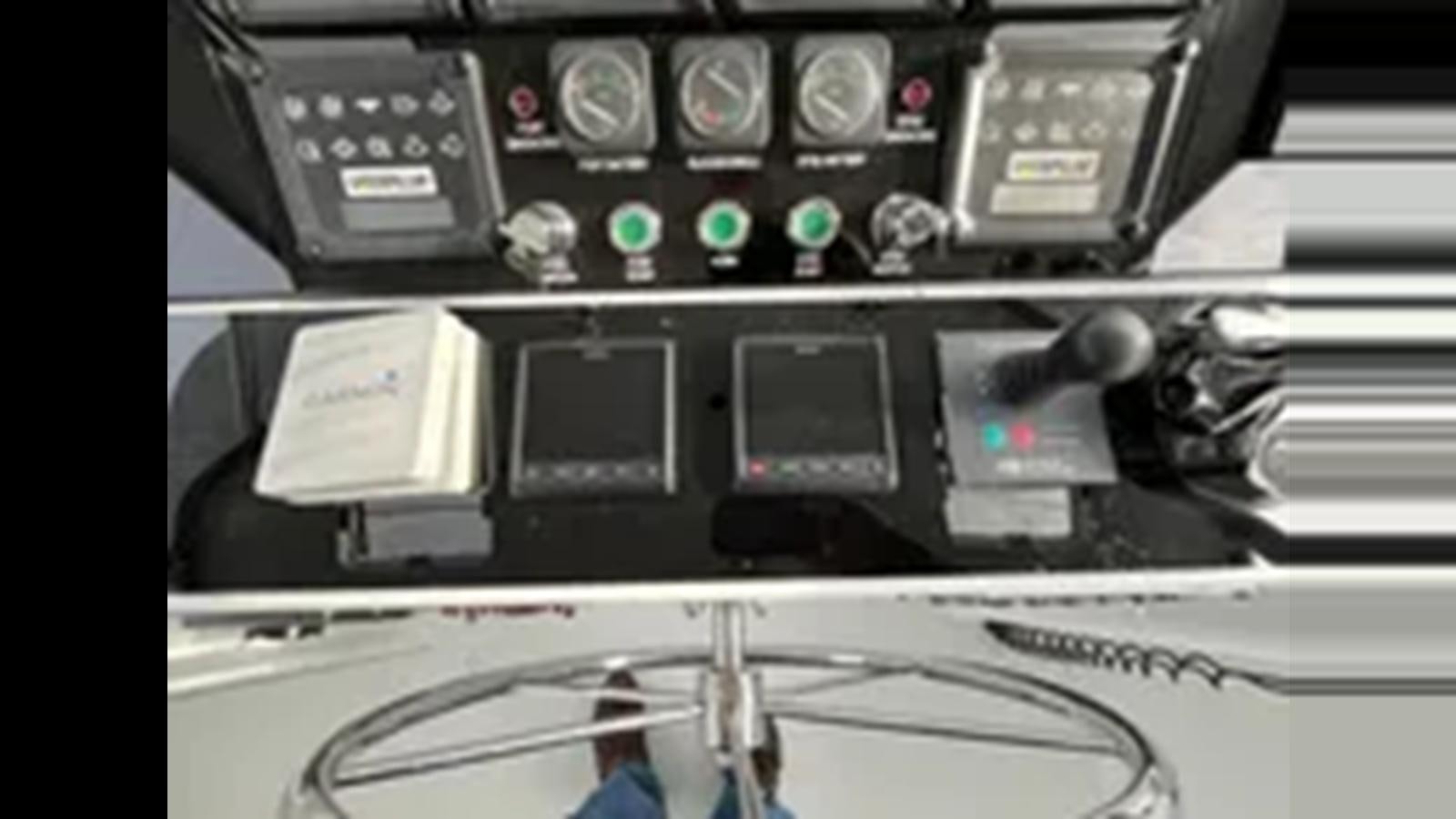 a close-up of a computer aboard 1999 HATTERAS 74 SPORT DECK MOTOR YACHT Yacht for Sale