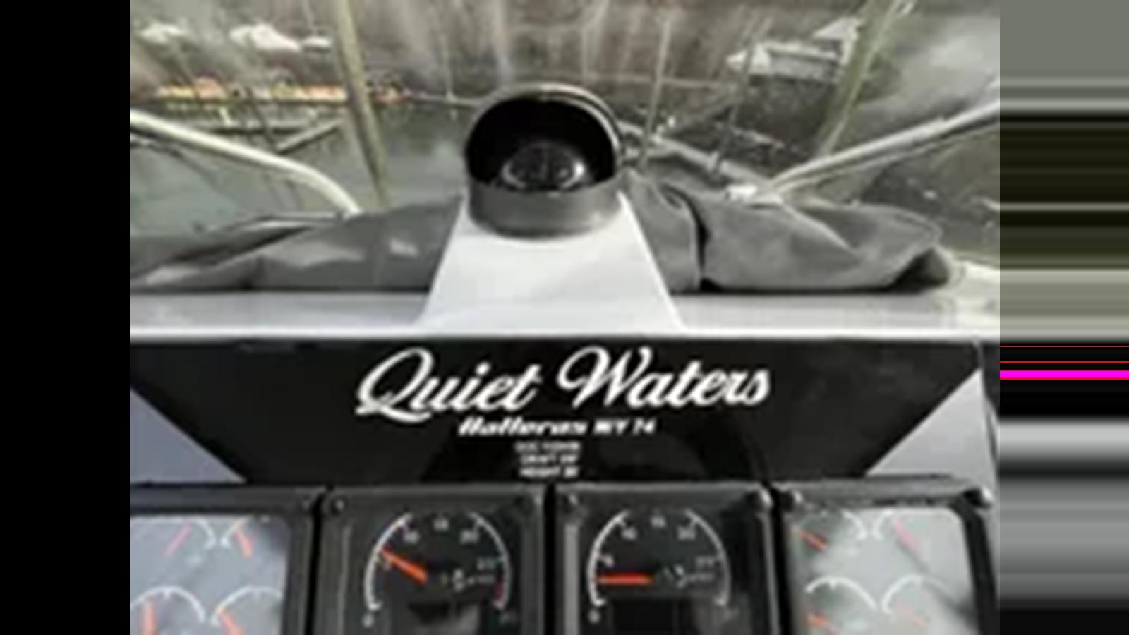 a car with a person in the front seat aboard 1999 HATTERAS 74 SPORT DECK MOTOR YACHT Yacht for Sale