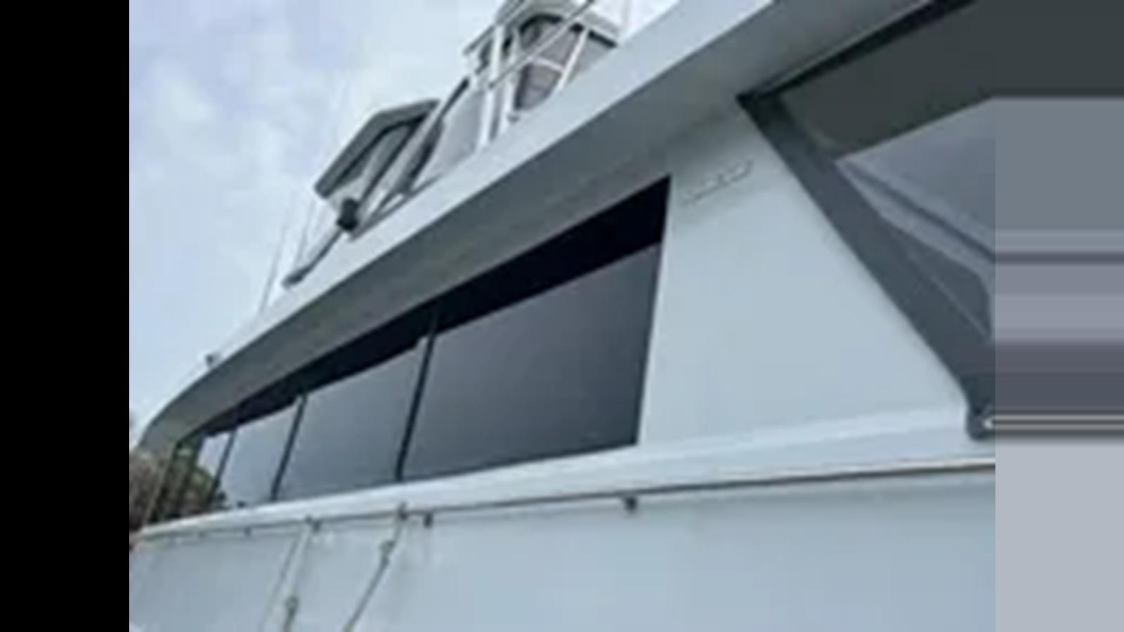 looking up at a plane wing aboard 1999 HATTERAS 74 SPORT DECK MOTOR YACHT Yacht for Sale