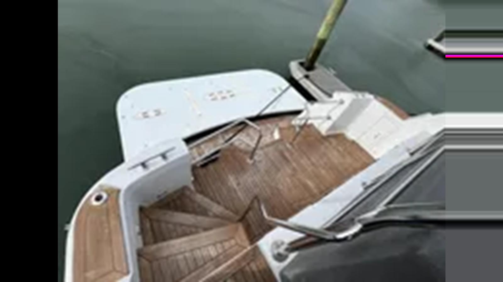 a white box with a handle aboard 1999 HATTERAS 74 SPORT DECK MOTOR YACHT Yacht for Sale