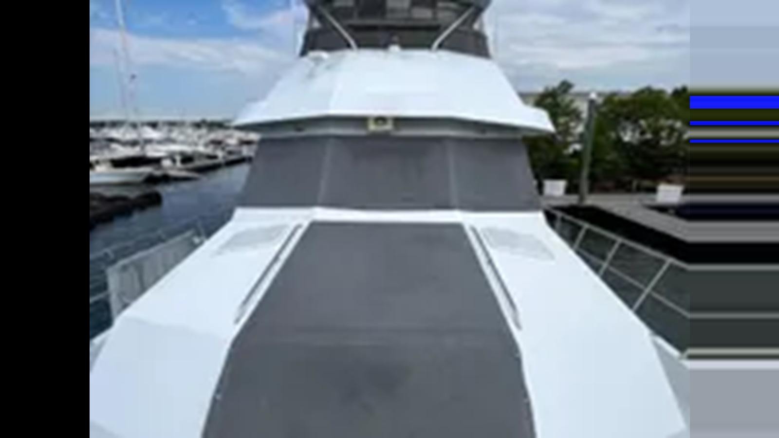a white building with a dome aboard 1999 HATTERAS 74 SPORT DECK MOTOR YACHT Yacht for Sale