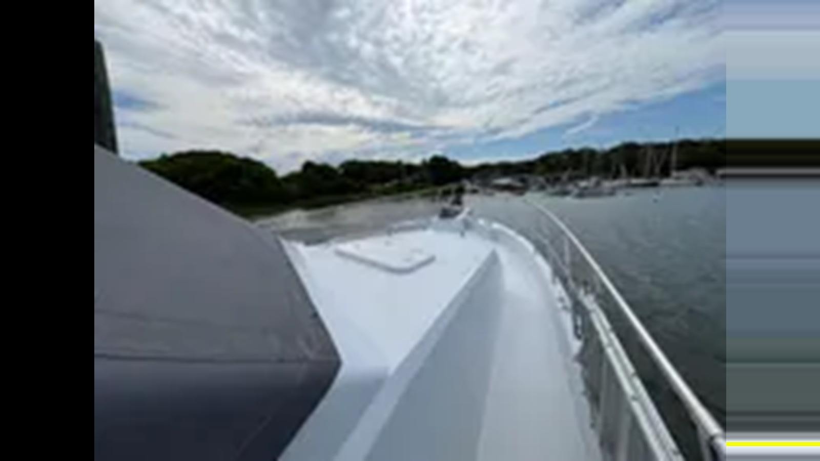 a view of a bridge over water aboard 1999 HATTERAS 74 SPORT DECK MOTOR YACHT Yacht for Sale