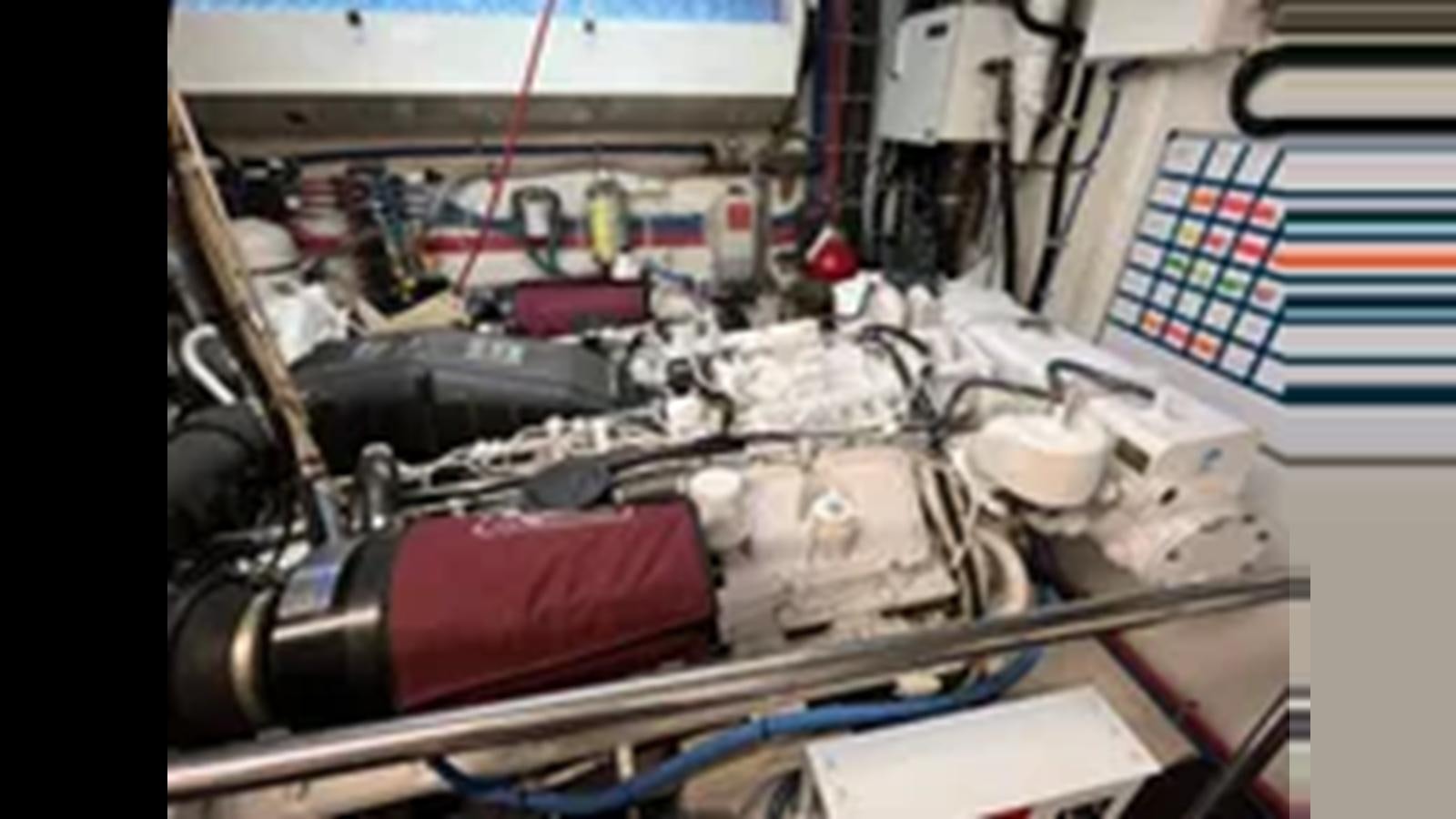 a machine with wires aboard 1999 HATTERAS 74 SPORT DECK MOTOR YACHT Yacht for Sale
