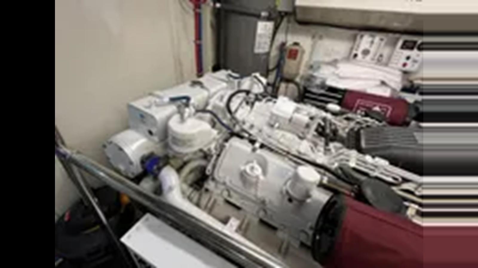 a machine with wires aboard 1999 HATTERAS 74 SPORT DECK MOTOR YACHT Yacht for Sale