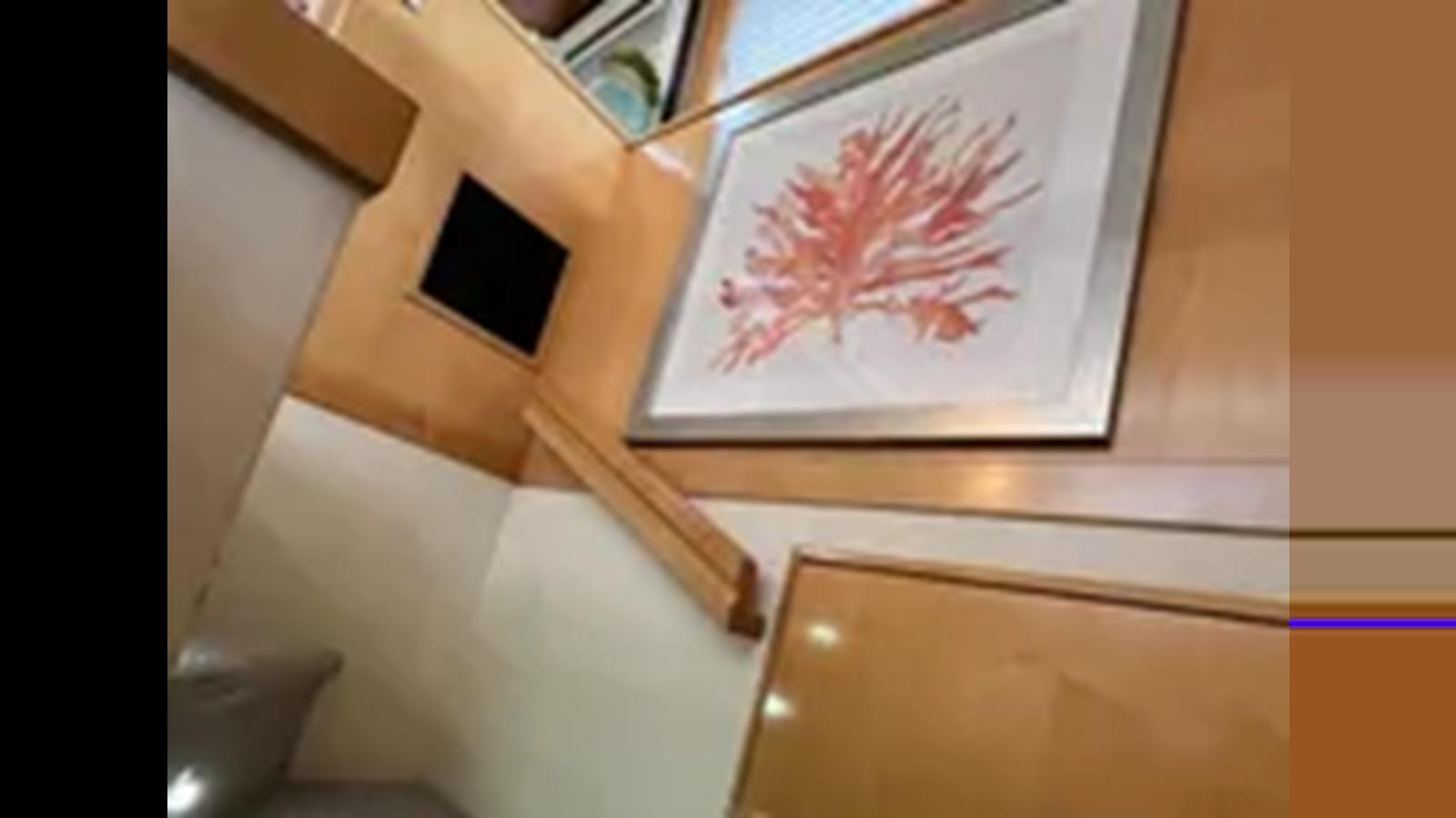 a painting on a wall aboard 1999 HATTERAS 74 SPORT DECK MOTOR YACHT Yacht for Sale
