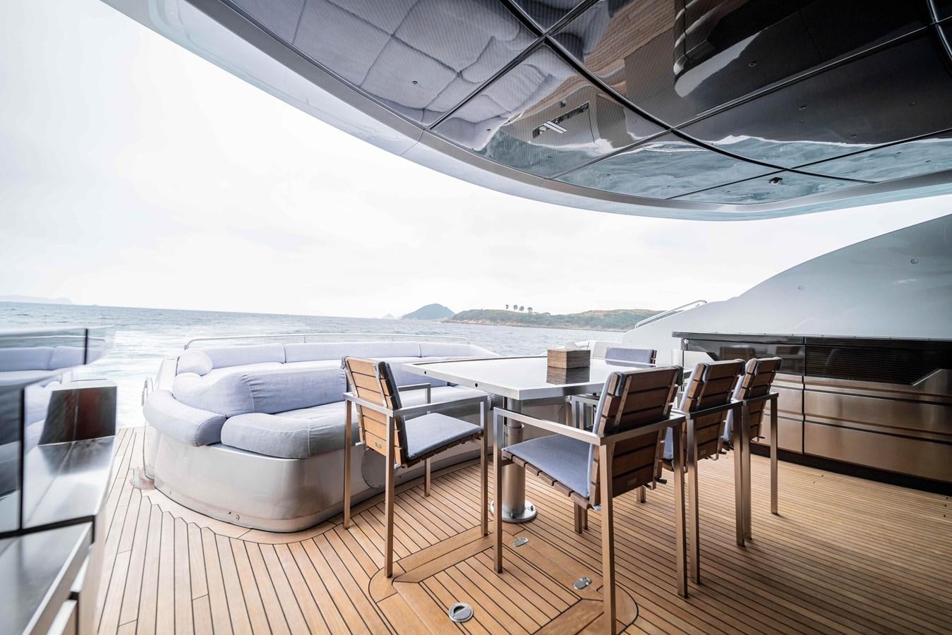 a room with a couch and chairs aboard GAMMA Yacht for Sale