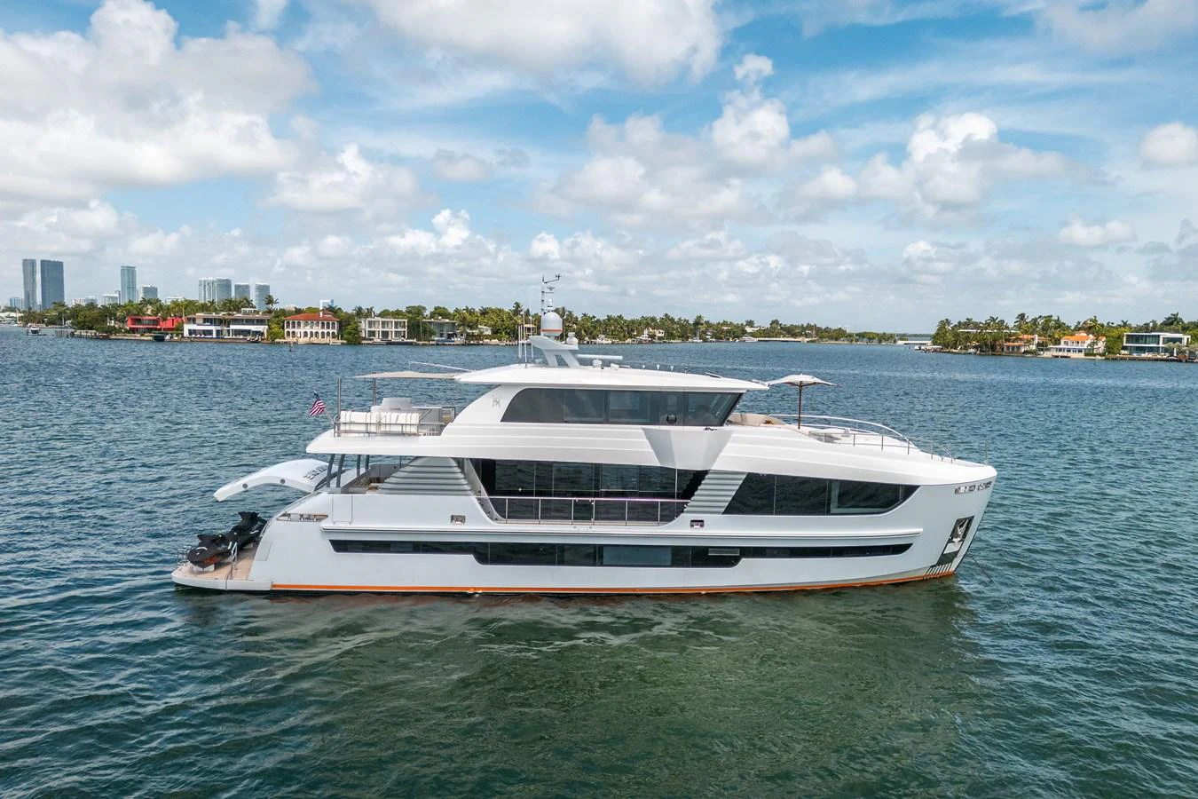 a white boat in the water aboard DAY ONE Yacht for Sale