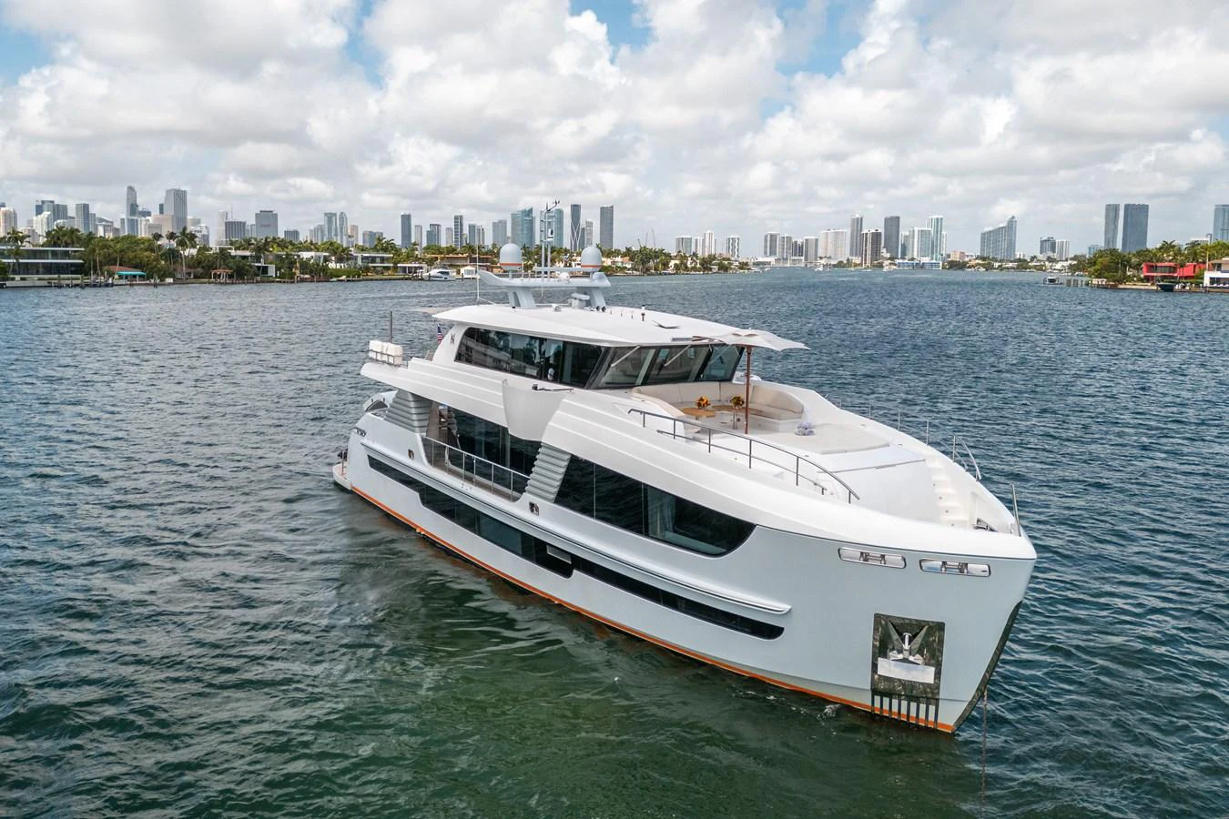 a white yacht on the water aboard DAY ONE Yacht for Sale