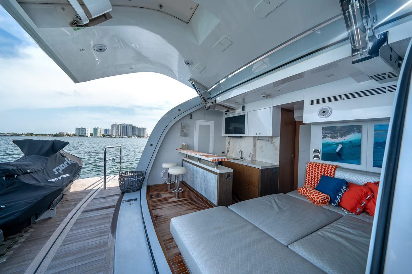 a large room with a bed and a large window aboard DAY ONE Yacht for Sale
