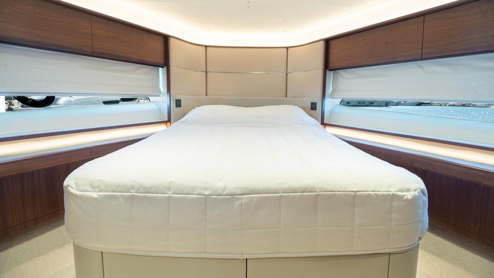 a bed in a room aboard SERENATA Yacht for Sale