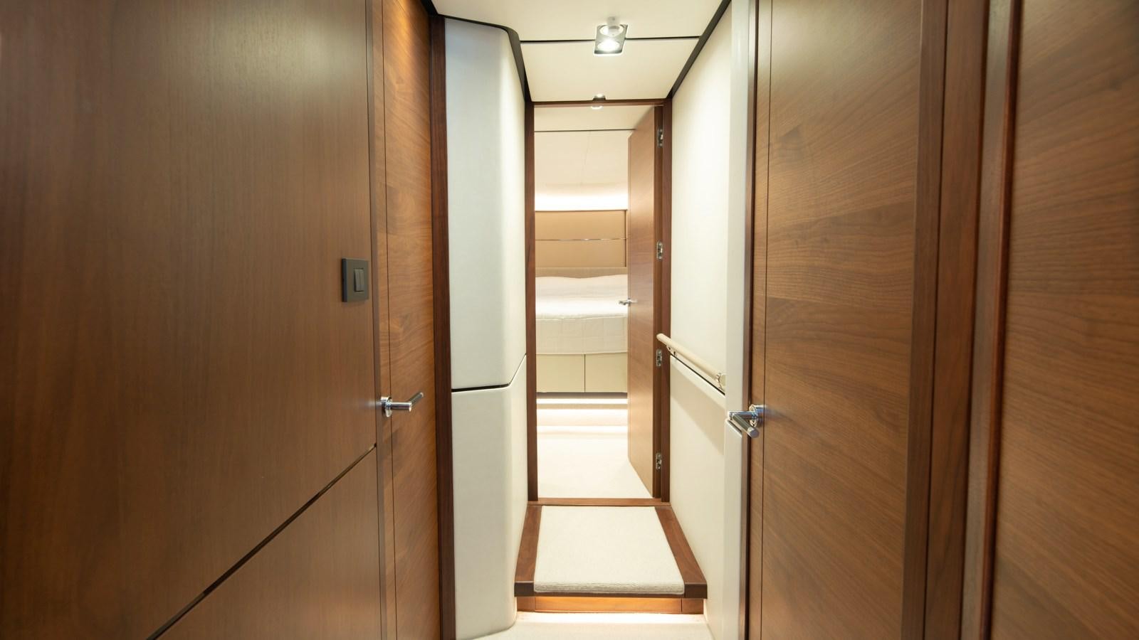 a hallway with doors aboard SERENATA Yacht for Sale