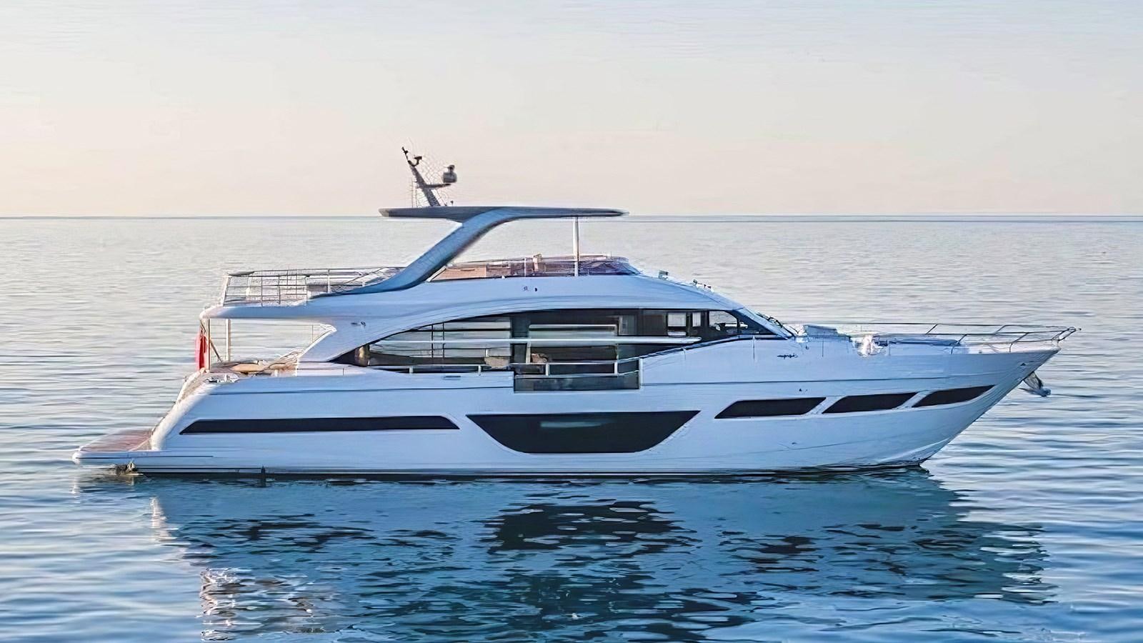 a white yacht in the water aboard SERENATA Yacht for Sale