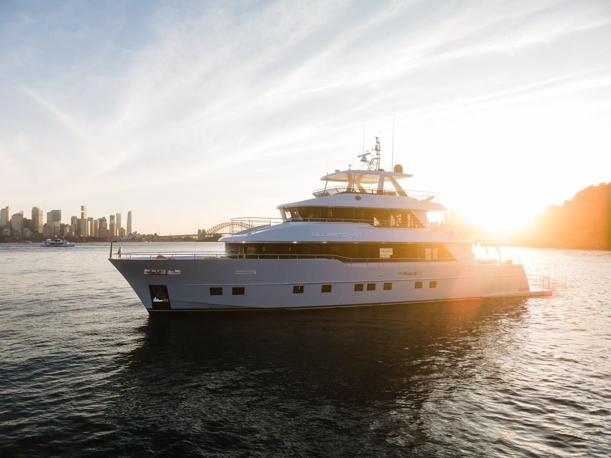 a large ship in the water aboard BLUESTONE Yacht for Sale