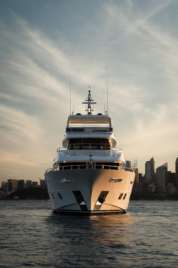 a large white boat in the water aboard BLUESTONE Yacht for Sale