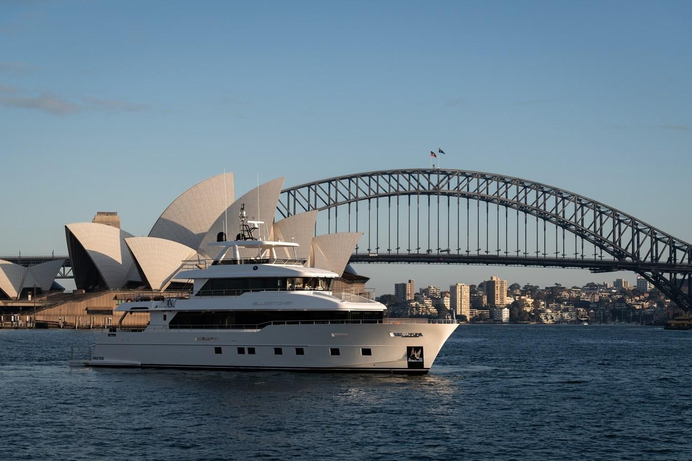 a large white boat in the water aboard BLUESTONE Yacht for Sale