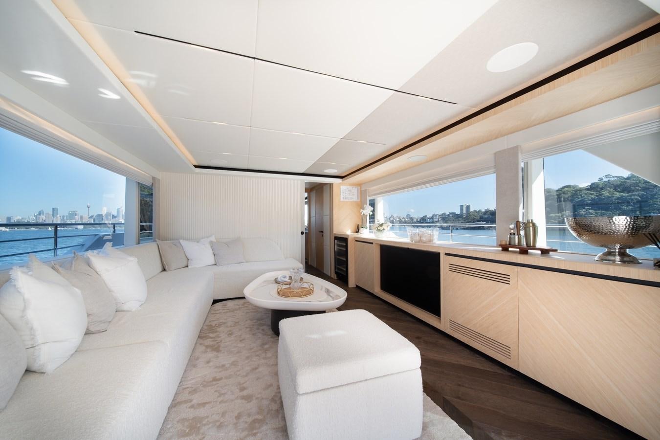 a modern looking living room aboard BLUESTONE Yacht for Sale