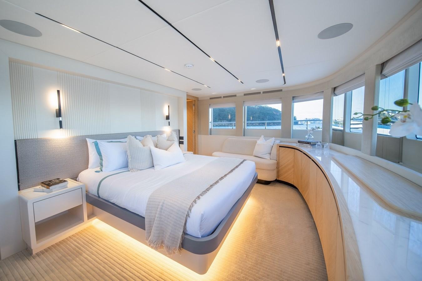 a large bedroom with a bed aboard BLUESTONE Yacht for Sale