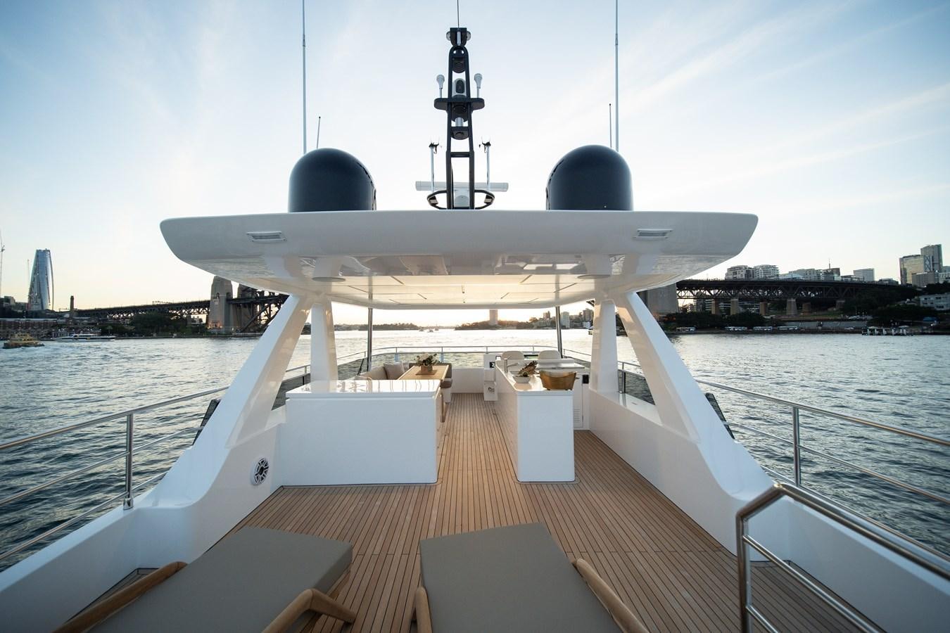 a large white ship with a large satellite dish on the deck aboard BLUESTONE Yacht for Sale
