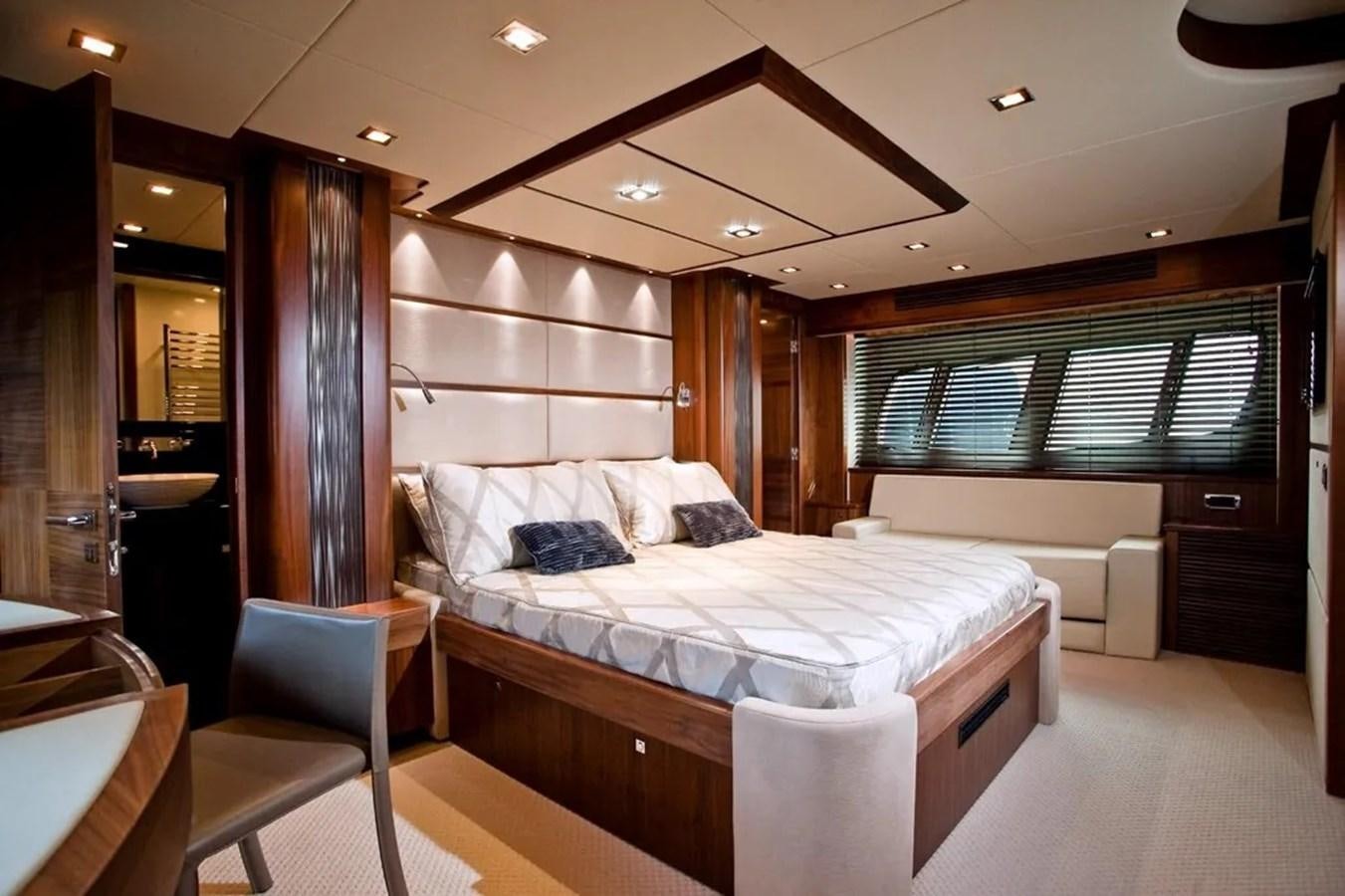 a bed in a room aboard SUNSEEKER 84 Yacht for Sale