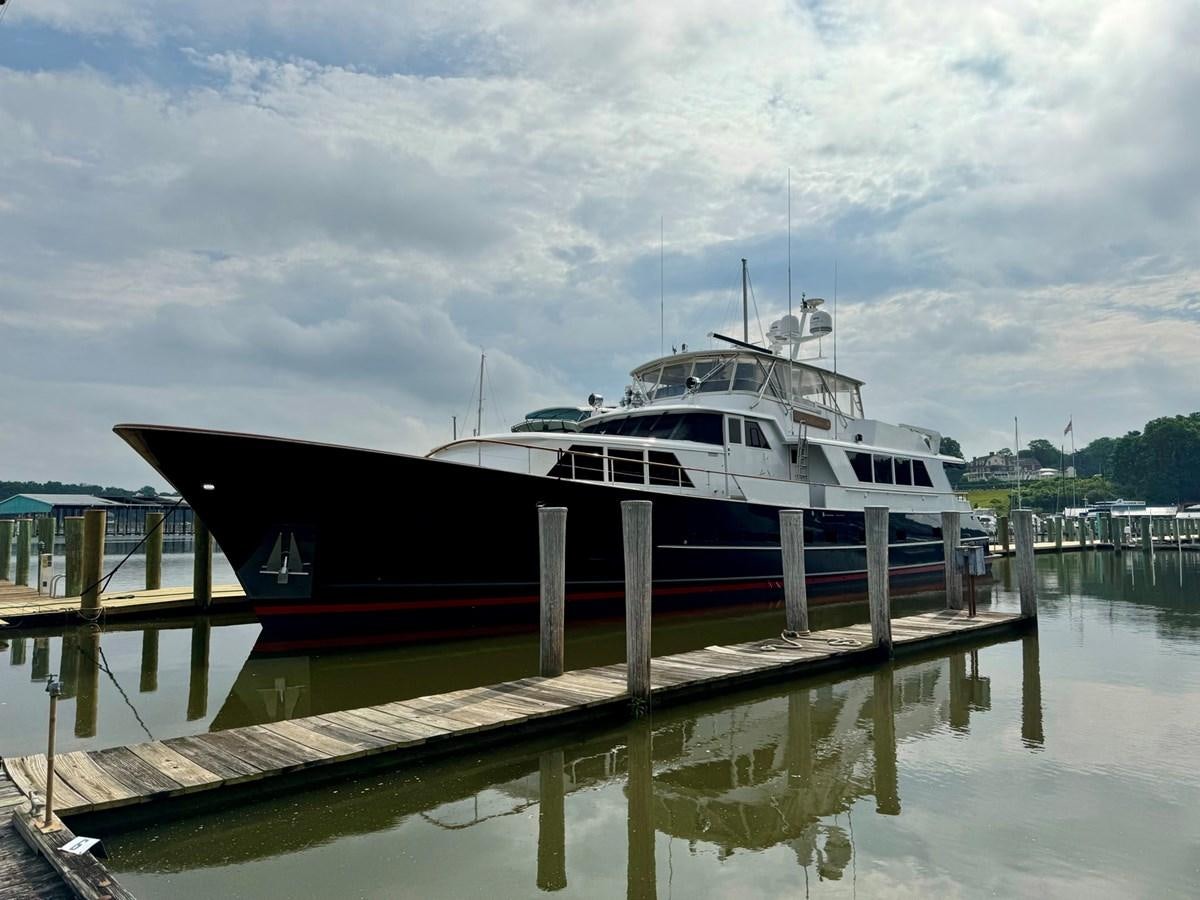 a boat docked at a pier aboard BRAVEHEART Yacht for Sale