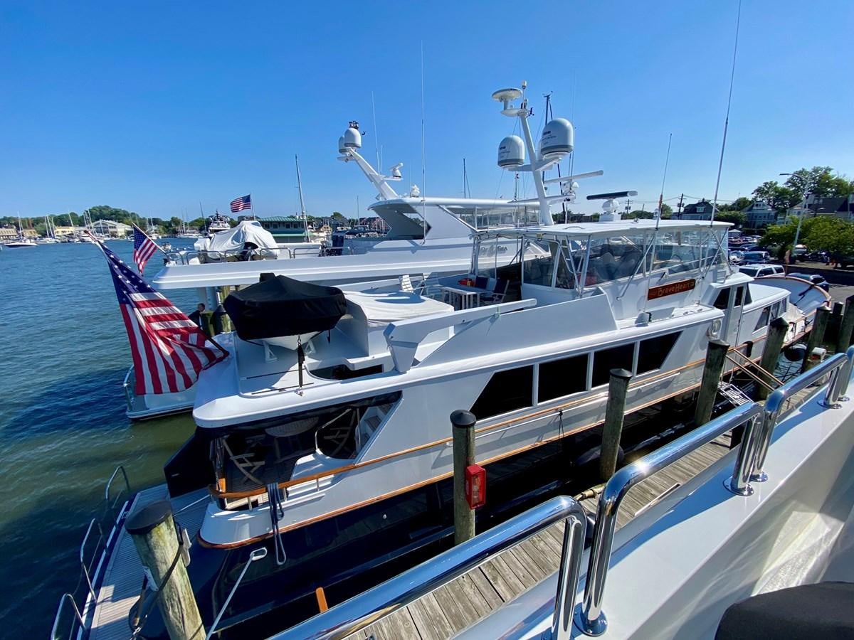 a boat is parked on the water aboard BRAVEHEART Yacht for Sale
