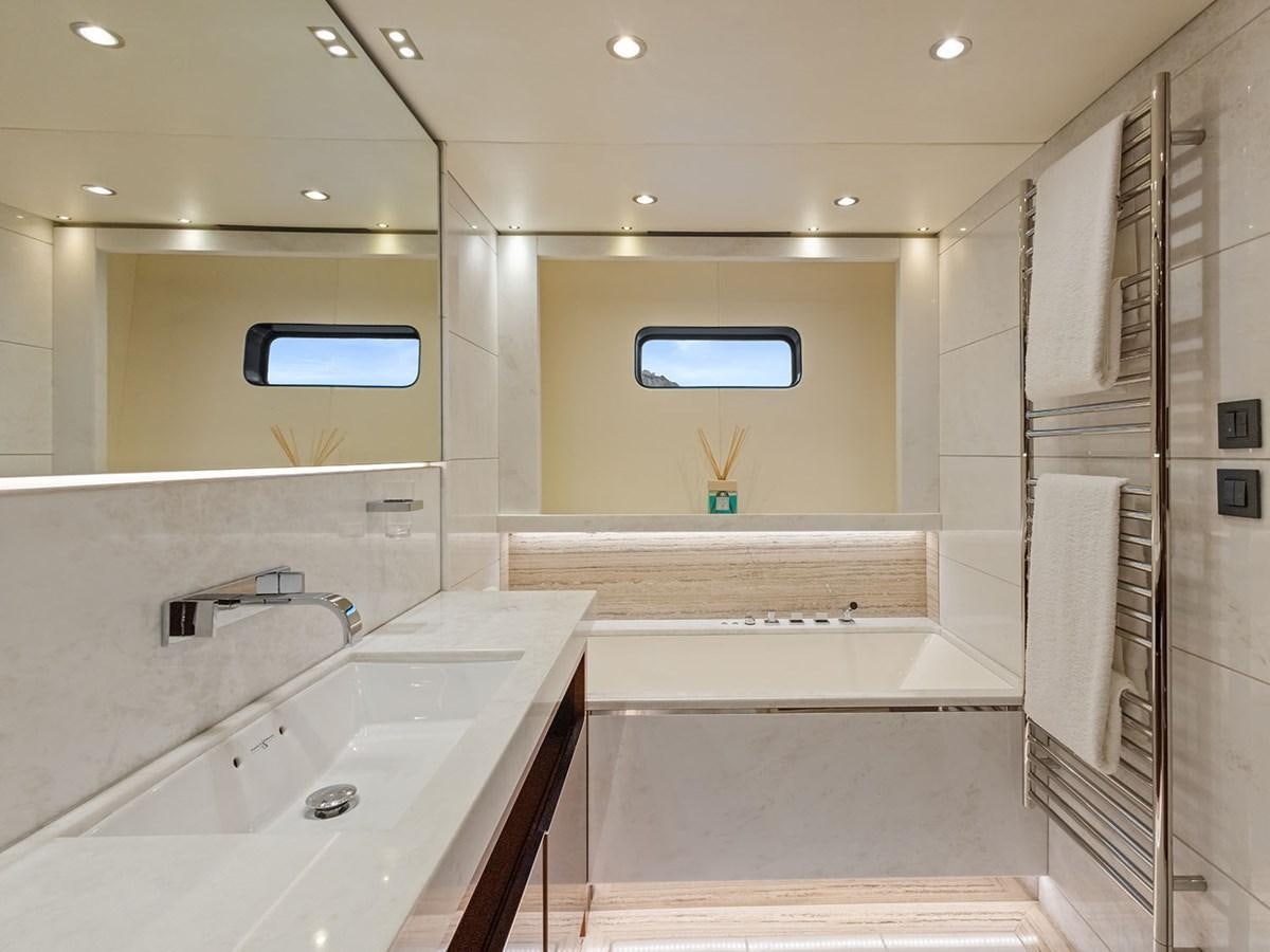 a bathroom with a sink and a shower unit aboard ACE 2 Yacht for Sale