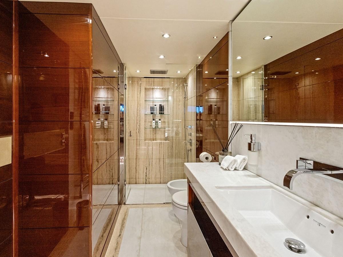 a bathroom with a sink and a shower aboard ACE 2 Yacht for Sale