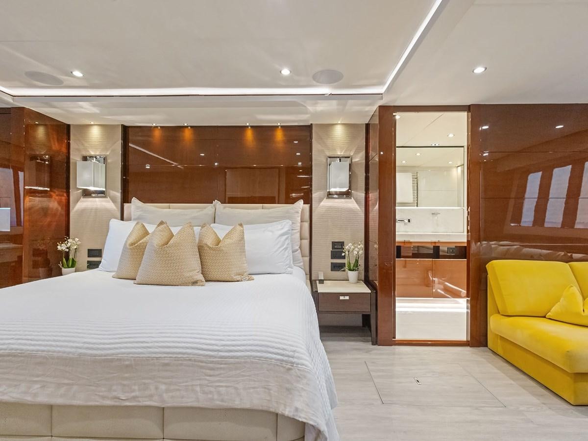 a large bed in a room aboard ACE 2 Yacht for Sale
