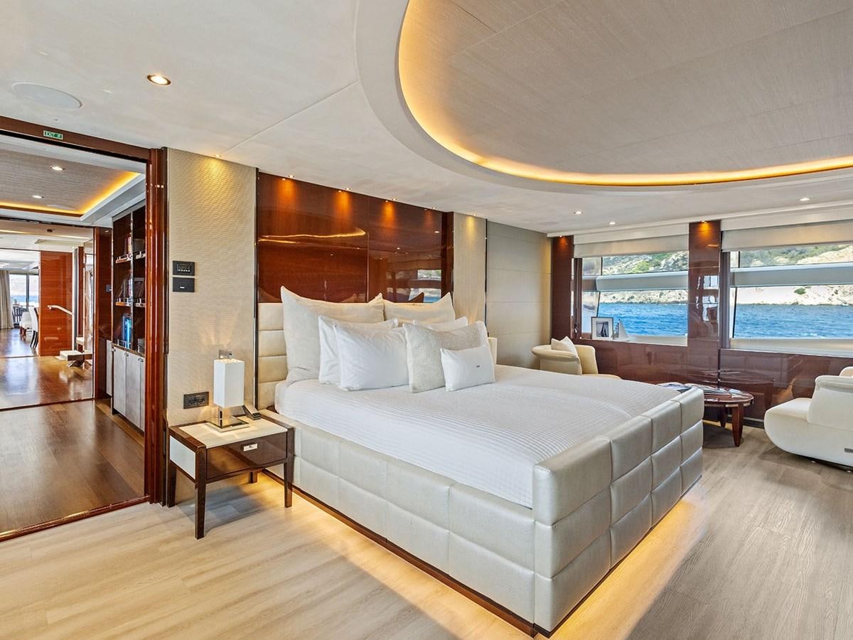 a large bed in a room aboard ACE 2 Yacht for Sale